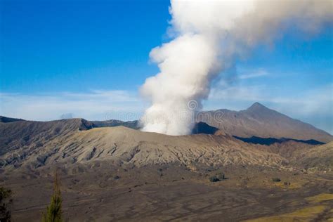 Smoke rising from volcano stock image. Image of rising - 105582487