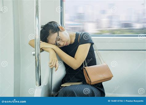 Passenger Woman Sitting and Sleeping in a Train Stock Photo - Image of sleepy, napping: 164814756