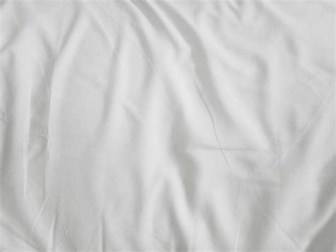 Premium Photo | Soft white wrinkled fabric background