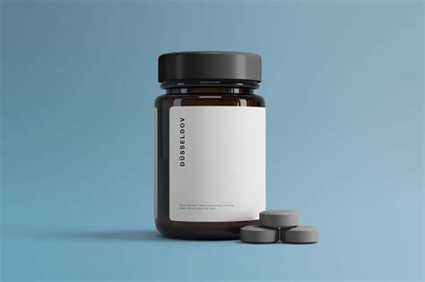 Free Medicine Bottle with Pills Mockup (PSD)