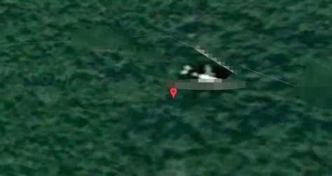 MH370 'crash site spotted on Google Maps' is surrounded by illegal ...