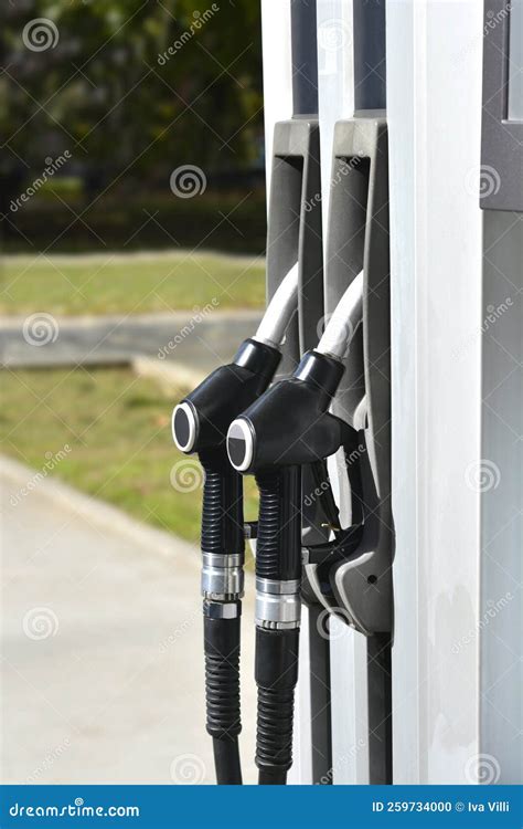 Gas station pump stock photo. Image of service, nozzle - 259734000