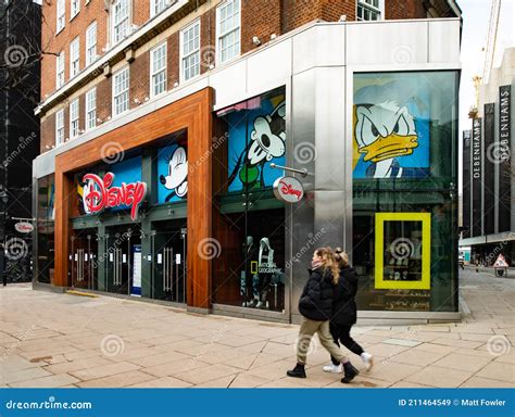 Shopper Walks Past Disney Flagship Store, Oxford Street, London ...