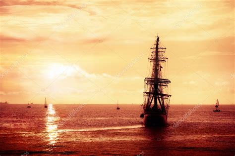 Pirate ship sailing in the sunset — Stock Photo © plrang #5841234