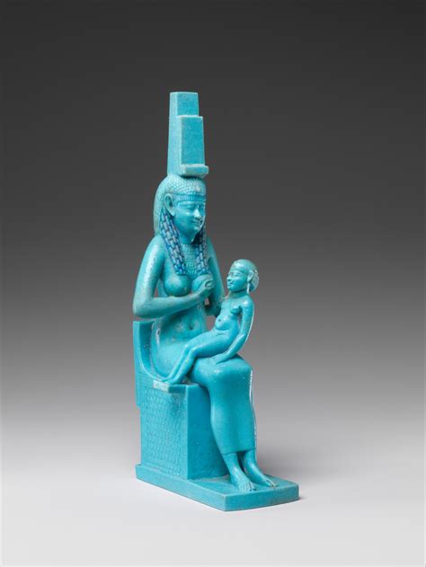 Ancient Egyptian statue of goddess Isis breastfeeds her son Horus made ...