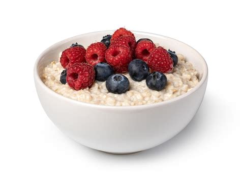 Premium Photo | Prepared oatmeal with berries