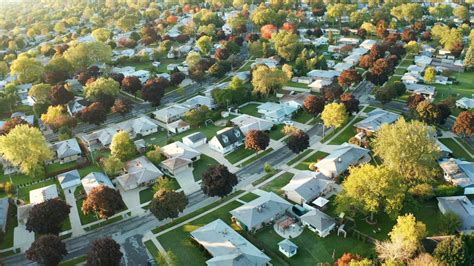 Aerial view of residential houses at autumn (october). American neighborhood, suburb. Real ...