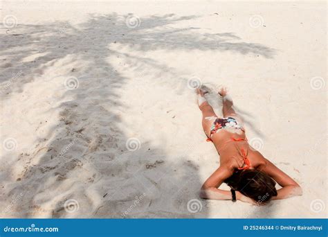 Woman on the sand stock photo. Image of back, shade, young - 25246344