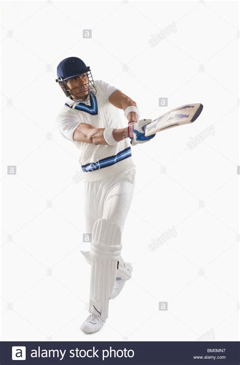 Cricket batsman playing a hook shot Stock Photo - Alamy