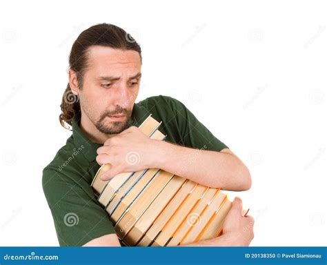 Man Holding Stack Of Books Stock Photo - Image: 20138350