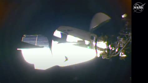 SpaceX Crew Dragon capsule carrying NASA astronauts docks with ISS