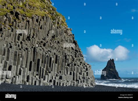 Basalt columns, Reynisfjara beach and one Reynisdrangar Pinnacle, near ...