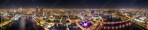 Epic night aerial view of the London, River Thames, London Eye ...