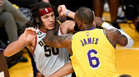 LeBron James shoves forearm into Aaron Gordon's throat in altercation ...