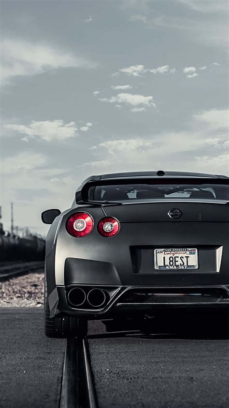 Download Matte Black GTR R35 Wallpaper | Wallpapers.com