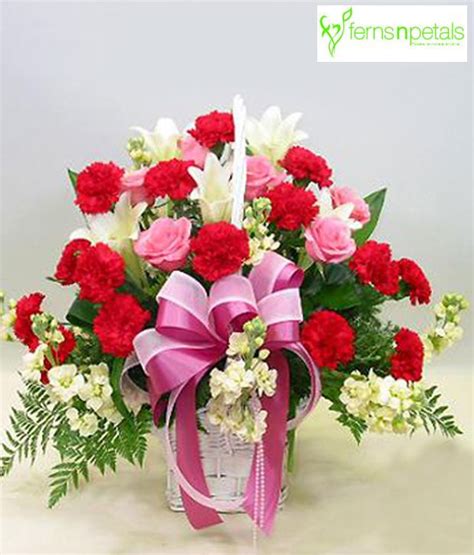 Ferns N Petals Basket Arrangement Of 20 Dark Pink Carnations, 10 Light Pink Roses And 5 White ...