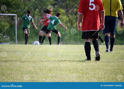 Teenagers Playing Soccer on an Outdoor Field Stock Image - Image of sport, nice: 160106949