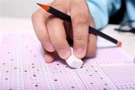 Hand erasing with pencil stock image. Image of hand, back - 495811