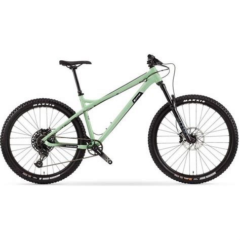 a green mountain bike with black spokes on the front and rear wheel, against a white background