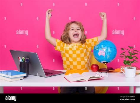 Child raising hand laptop hi-res stock photography and images - Alamy