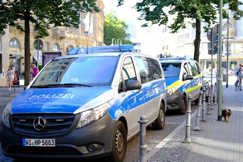 Police Cars on Streets of Germany, Law Enforcement Officers Guarding Order on Vehicles ...