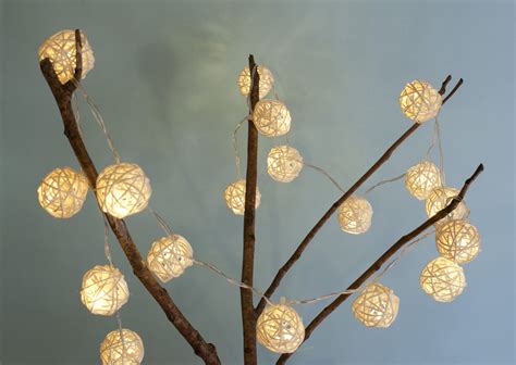 Photo of lighted garland on twigs | Free christmas images