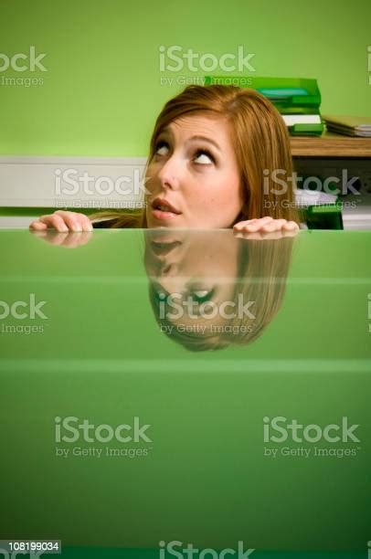Scared Office Worker Hiding Under Desk Stock Photo - Download Image Now - Hiding, Office ...