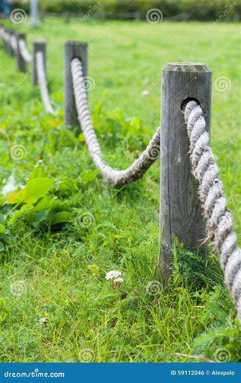 Decorative Fence Made From Wooden Posts And Rope Royalty-Free Stock Image | CartoonDealer.com ...