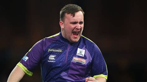 World Darts Championship: Teenager Luke Littler defeats Andrew Gilding ...