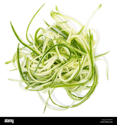 top view of cucumber vegetables julienned for salad isolated on white ...