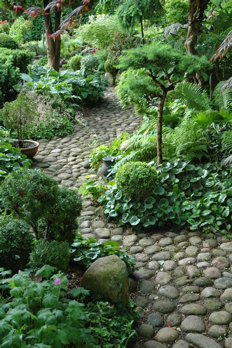 Enhacing Your Landscape River rock garden path - house-ideas.org