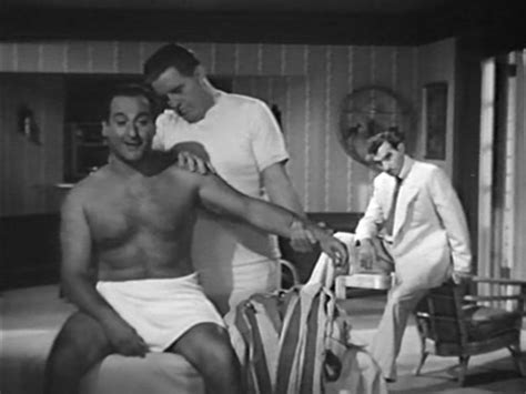 George Tobias (Abner Kravitz in Bewitched) gets a massage from Gene ...