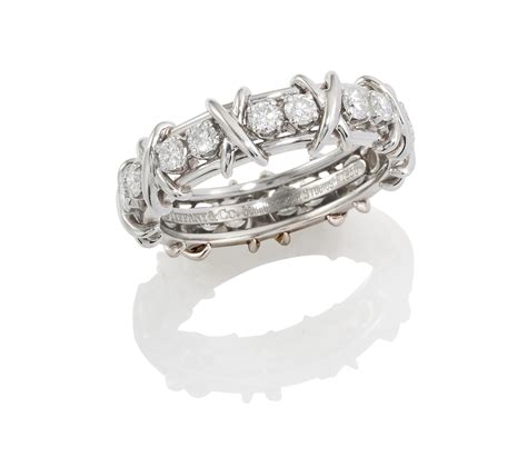 A PLATINUM DIAMOND 'SIXTEEN STONES' ETERNITY RING, BY JEAN SCHLUMBERGER FOR TIFFANY & CO ...