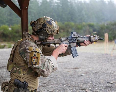 A Canadian Special Operations Regiment (CSOR) soldier fires his C8 ...