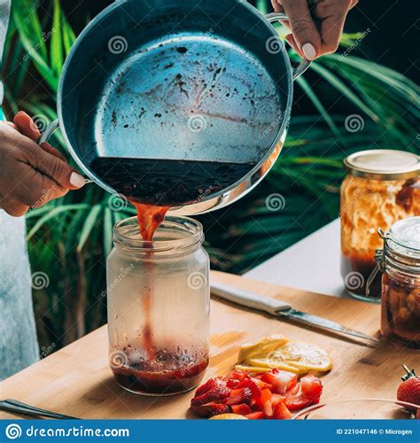 Pouring Fruit Jam into a Jar, Canning at Home Stock Photo - Image of making, process: 221047146