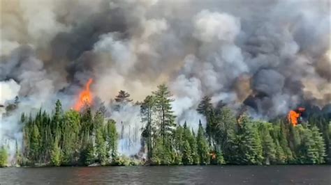 Flames visible from the water as forest fire burns west of Ottawa | CBC.ca