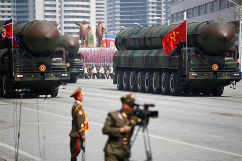North Korea rolls out new missiles during huge military parade - CBS News