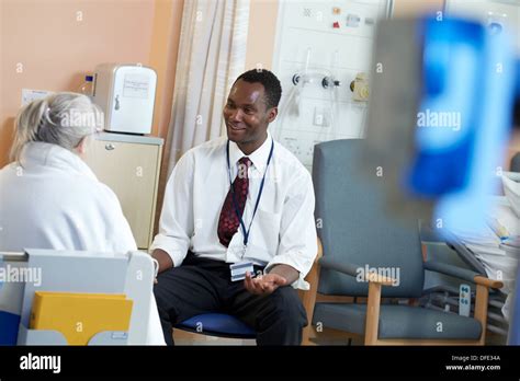 hospital chaplain with a patient Stock Photo - Alamy