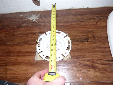 How to Install a Toilet Flange on a Concrete Slab