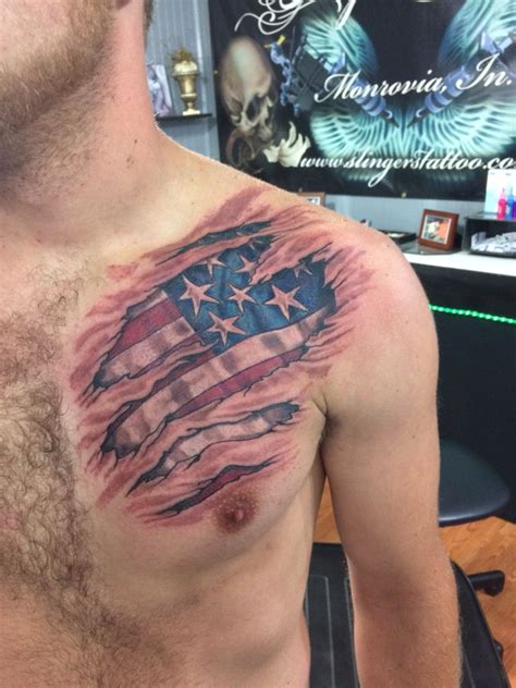 a man with an american flag tattoo on his chest