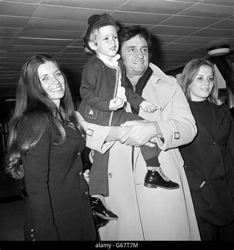 Johnny Cash Singer with wife June Carter Cash son John Carter Cash and son of Roy Orbison Wesley ...