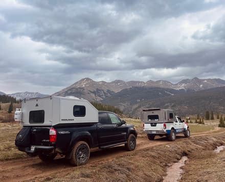 Moonlander truck RV tightropes ingeniously between camper and cap