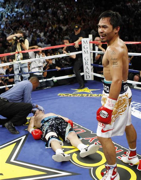 Pacquiao Stuns Hatton with a right hook and a left cross punch ...