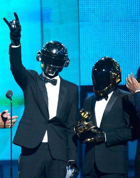 Daft Punk accepts the Best Pop Duo/Group Performance GRAMMY for "Get Lucky" on the 56th Annual ...