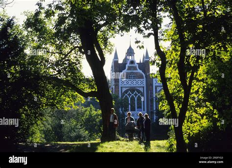 People near Gothic House, Dessau-Worlitz Garden Realm, Worlitz, Saxony ...