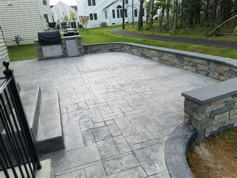 R- Stamped Concrete Patio, Seating wall with flagstone caps and dropped ...