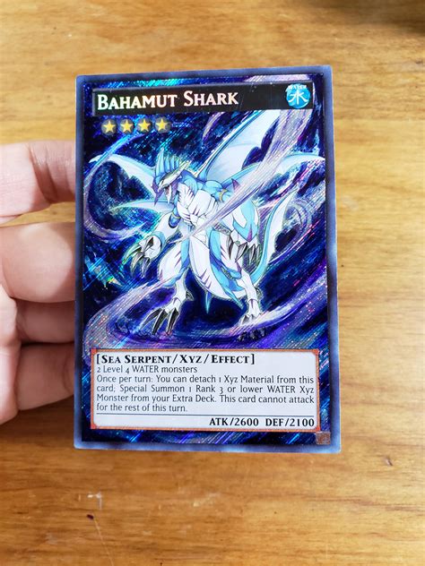 I like to color on Yugioh cards. Here's a Bahamut Shark, post-art ...