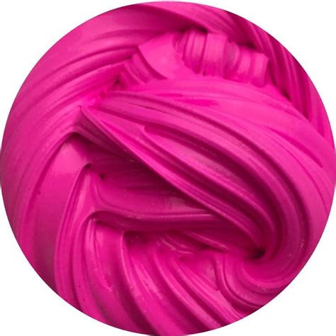 a ball of bright pink dye on a white background