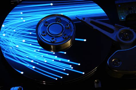 Close Up Of Open Computer Hard Disk Drive With Light Effects And Reflex Background Stock Photo ...