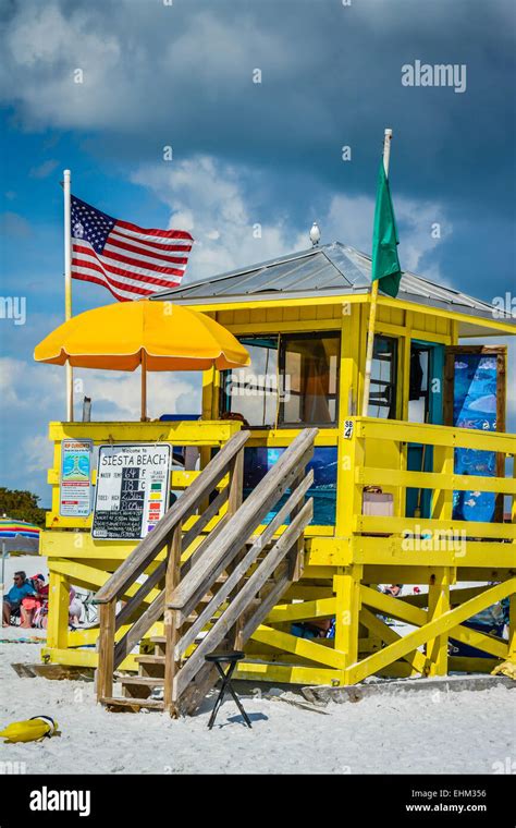A colorful life guard stand at Siesta Key Beach on a warm and cloudy day in Sarasota, Florida ...